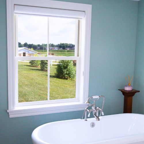 Bathroom window with farmland view