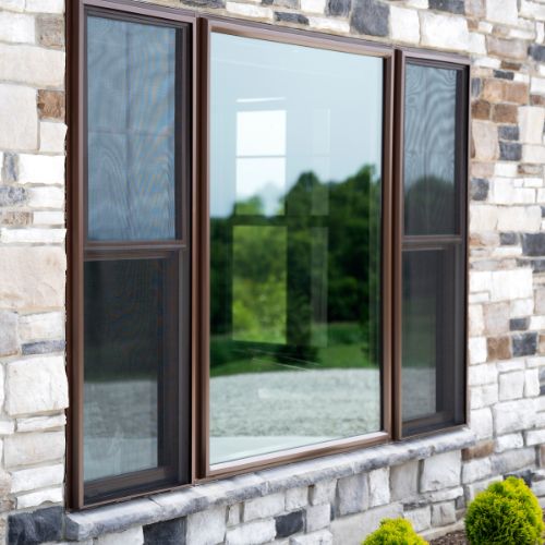 Triple window on stone exterior